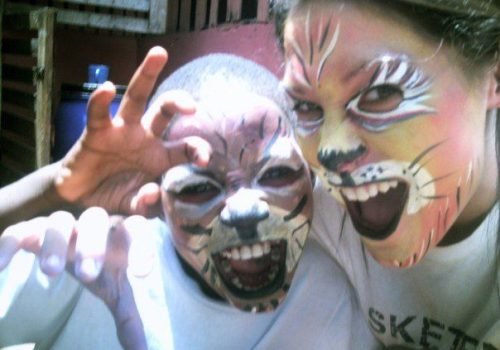Participant-and-student-with-painting-on-their-faces